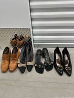 All four pairs of shoes lined up