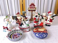 Group shot of all eight Coca-Cola Christmas ornaments