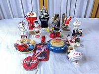 Group image showing all Coca-Cola Christmas ornaments and decorations