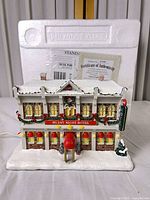 Front view of Coca-Cola Silent Night Hotel building with Styrofoam insert behind