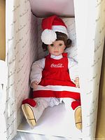 Courtney doll seated inside original Danbury Mint box showing full outfit and shoes