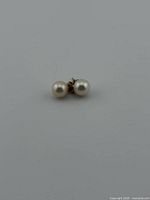 Front view of pearl stud earrings