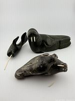 Three soapstone carvings grouped