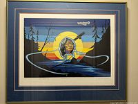 Full view of framed indigenous print showing imagery, matting and frame