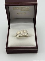 Ring in presentation box showing design and overall condition