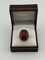 Ring in presentation box showing stone and setting