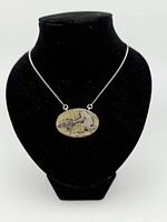 Necklace displayed on bust showing overall appearance