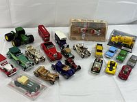 Group shot of all vehicles laid out on white cloth