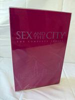 Sealed or shrink-wrapped magenta slipcase front
