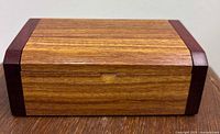 Front view of exotic wood box closed