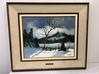 Framed painting front view showing full artwork, mat and frame