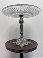 Full view of cake stand on table