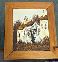 Front view of framed oil painting