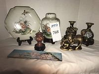 Group shot showing all seven decorative items