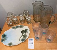 All items: tray, six lotus tumblers, three fish tumblers, two pitchers