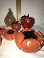 Group showing pear, apple and orange fruits for scale and condition