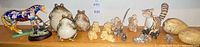 Full shelf view of all animal figurines