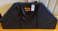 Black fabric carrying case closed