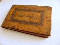 Front olive wood cover showing carved Jerusalem title
