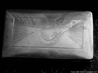 Top view showing etched sun motif and radiating design