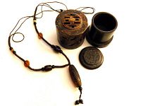 Box and necklace laid out showing contents