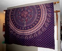 Full view of hanging cotton mandala tapestry