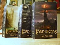 Front covers of all three Lord of the Rings paperbacks standing upright