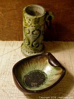 Vase and bowl together showing size and color