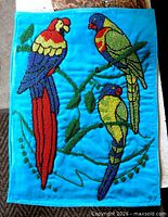 Front view of beaded parrot wall hanging
