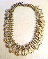 Full view of sterling Kasumala choker showing lion medallions and clasp