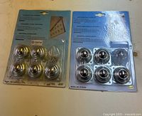 Two blister packs of Craftex universal ball bearings, six per pack