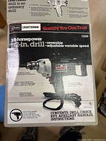 Retail box displaying Sears Craftsman branding and drill specifications