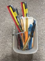 assorted hacksaw frames, loose blades and boxed blades in tote