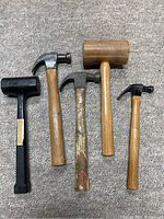 group shot of five hammers and mallets