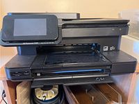 Front view of HP Photosmart 7520 printer showing full unit