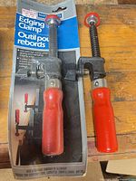 Two Mastercraft edging clamps, one packaged, one loose