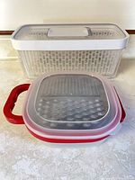 OXO produce keeper and red-handled grater container, full view