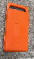 closed orange plastic case
