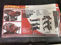 Box insert showing Olympia Tools Pack-N-Roll collapsible service cart features