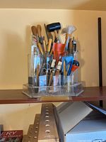 overall view of organizer stand filled with tools