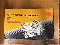 Retail box showing illustration and specifications of 3.5-inch swivel-base vise