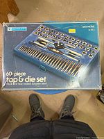 Closed box showing Mastercraft 60-piece tap & die set branding