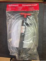 Front view of sealed Siphon-Mate transfer pump in package