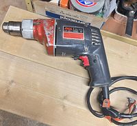 Left side view of Skil 599C corded drill showing body, chuck, label