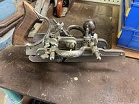 Left profile of plane showing handle, fence, body casting