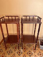 Two matching wooden side tables, full view