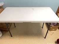 Top view of white folding table set up