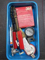 Overview of lot items inside blue bin