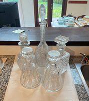 Group view of all six decanters on countertop