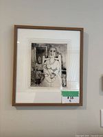 Frontal view of framed John Snow lithograph with edition sticker visible